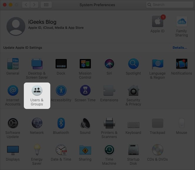 Ouvrez le menu Apple et cliquez sur Utilisateur et groupes dans les préférences système Mac