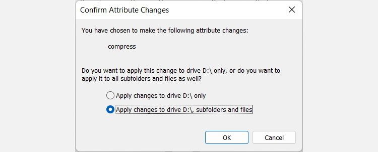 confirmation des modifications d'attributs pour un disque dur après avoir activé la compression de fichiers dans Windows 11