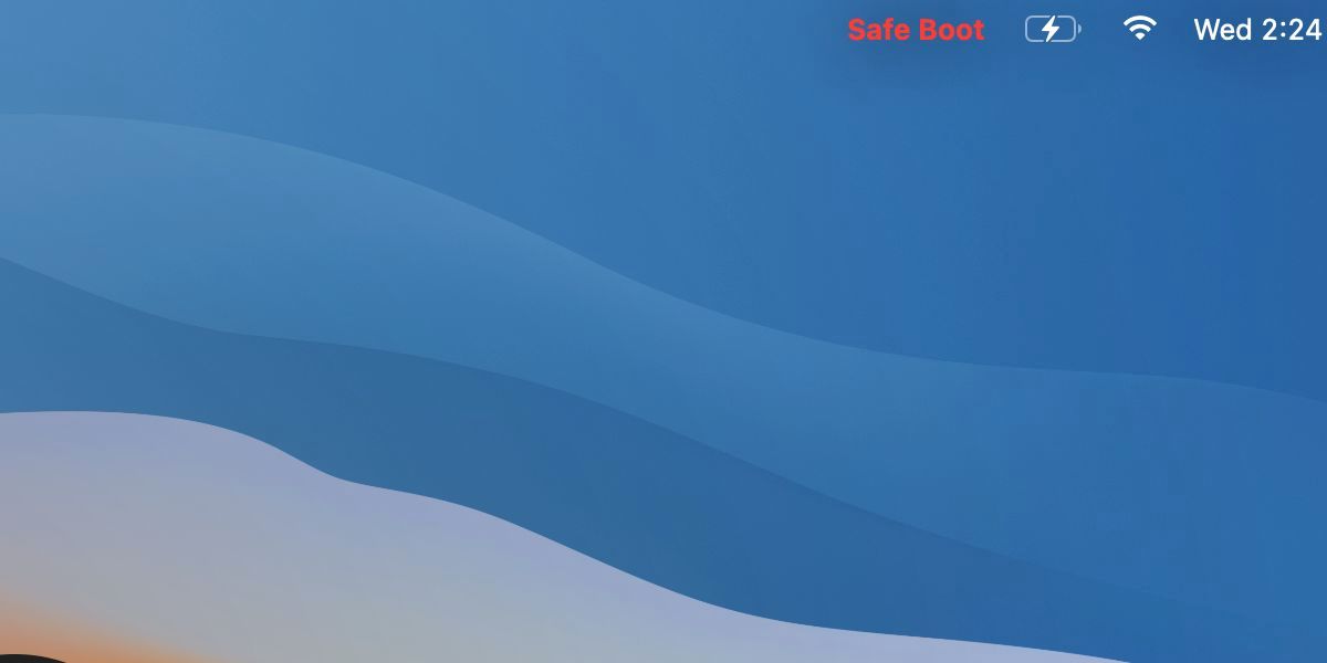 Coin de l'écran de connexion Mac Monterey avec Safe Boot en rouge.